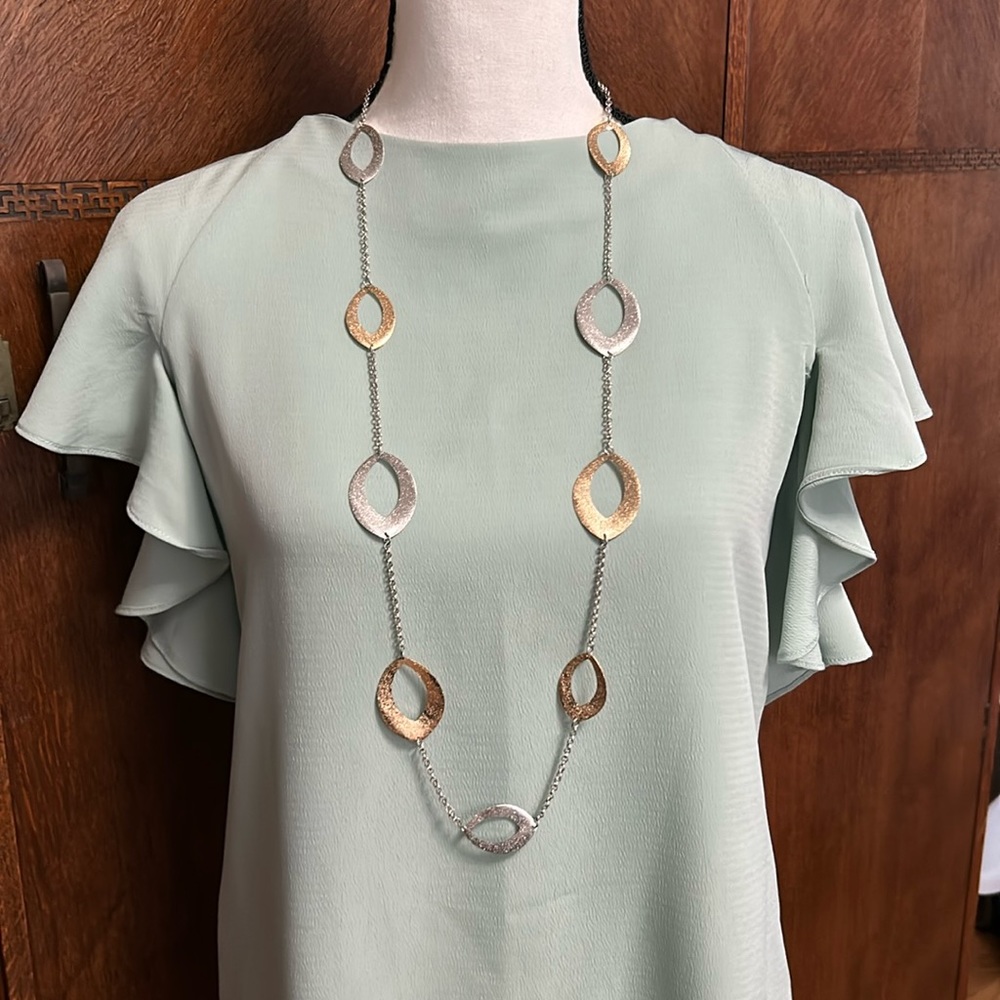 Big loop silver tone, and gold tone necklace